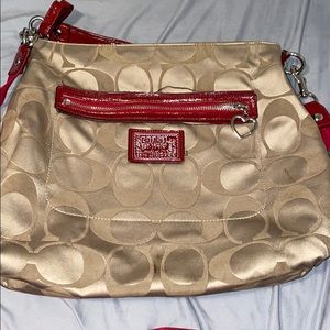 Brown with red crossbody coach purse
